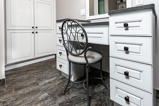 Bathroom storage solutions are a key component to any bathroom design. This ReBath bathroom remodel in Omaha featured creating room for a custom linen closet and make up table apart from the bathroom vanity for extra storage and a bathroom solution that really works for the customer's needs.