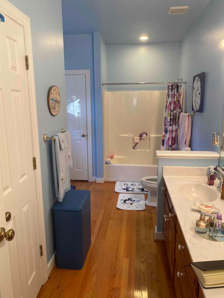 Many homes have wood floors in the tub and shower area. This customer has chosen to have that replaced with tile during the full bathroom remodel.
