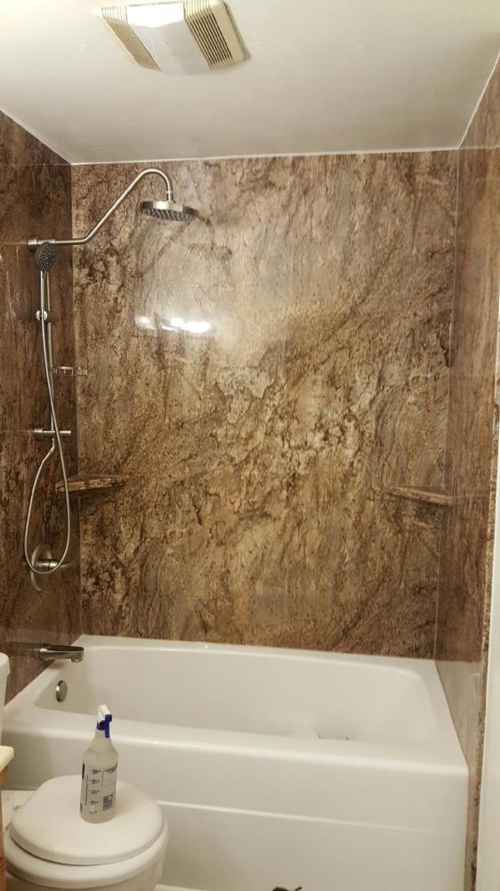 Tahoe granite walls and rain shower head