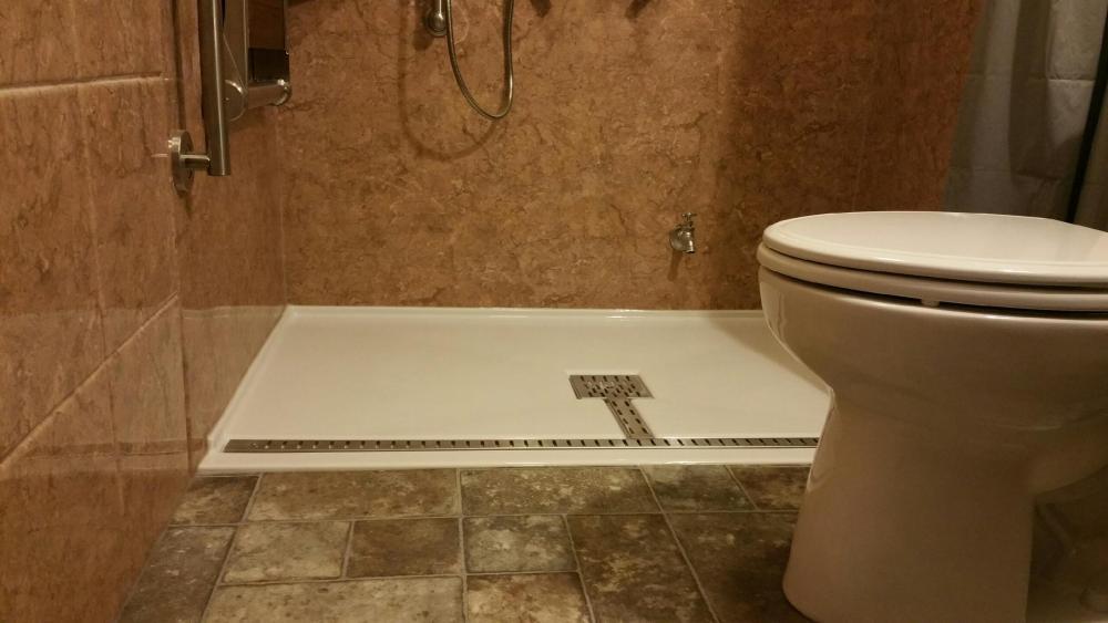 After Re-Bath Quad Cities, IL renovation with Wheelchair accessible shower base with trench drain