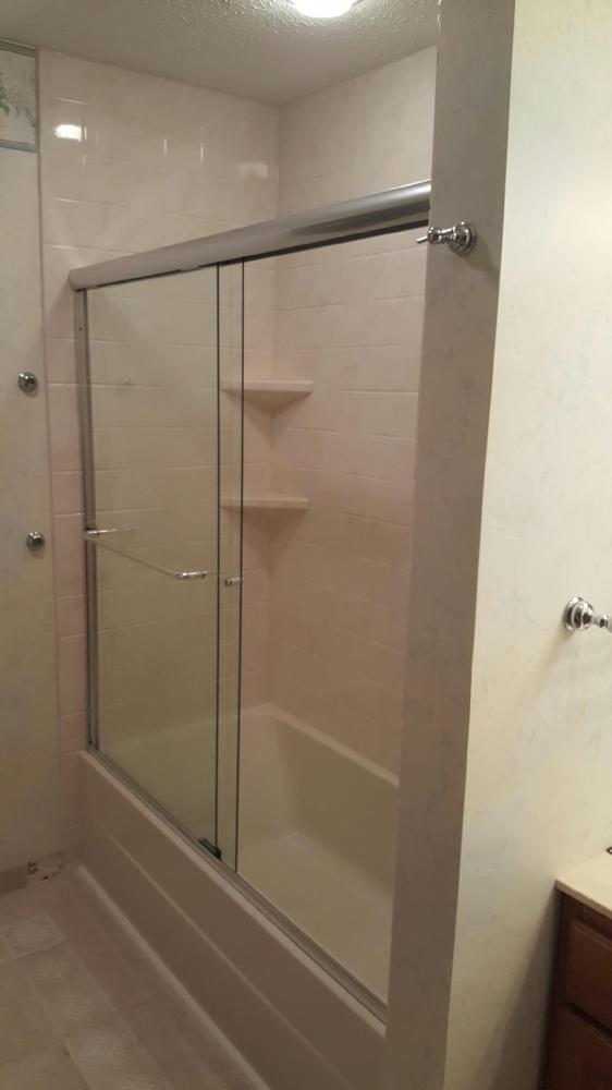Replacement tub with travertine walls