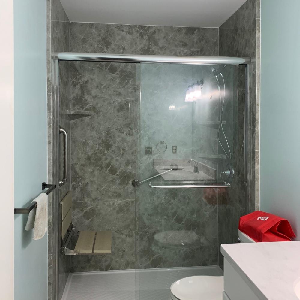 Bilanx waterproof luxwood folding seat. Grey Emperador Acrylic Walls