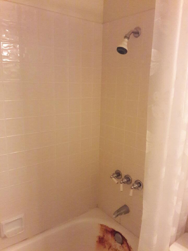 Before Re-Bath San Diego, CA renovation Rusted bathtub before liner installed