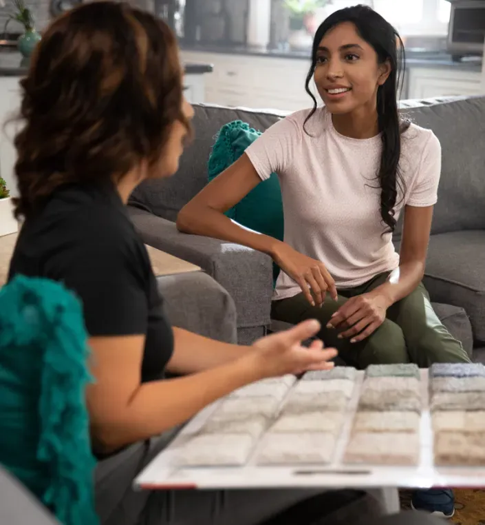 women discussing flooring options