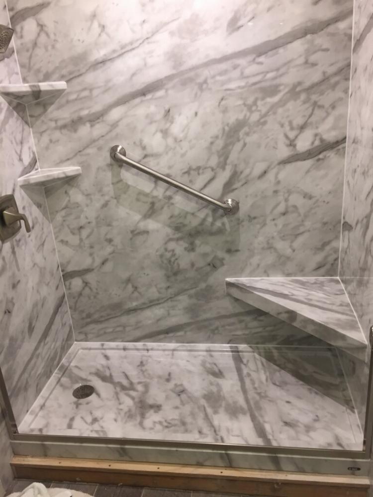 After Re-Bath San Diego, CA renovation with white calcutta walls with matching shower pan